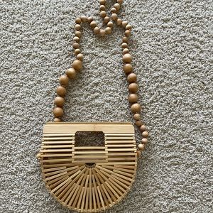 Cult Gaia wooden beaded purse